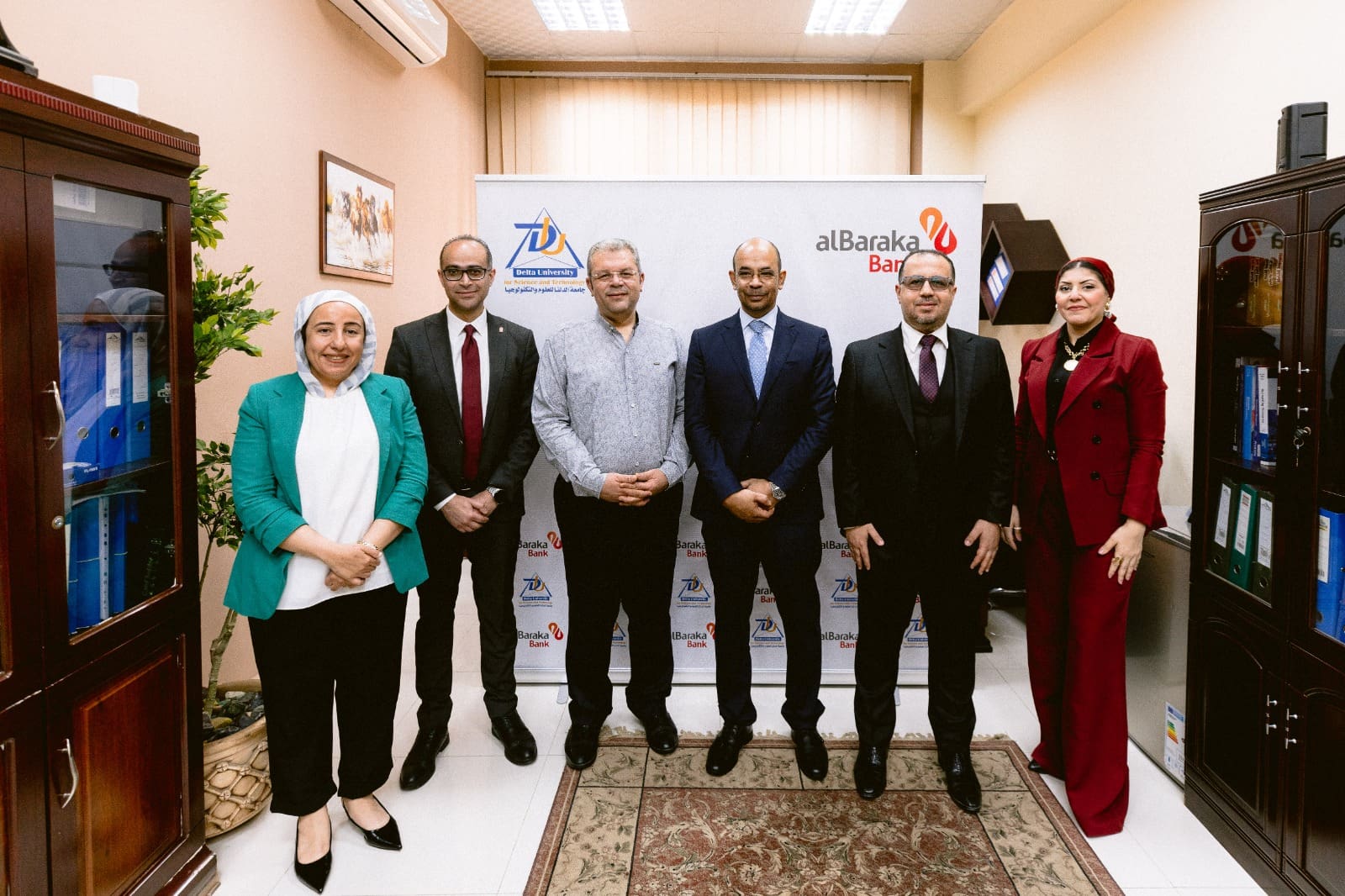 بنك البركة مصر يوقع مذكرة تفاهم مع جامعة الدلتا للعلوم والتكنولوجيا لتعزيز الشمول المالي وتمكين الشباب 1 Group Photo بنك البركة مصر بنك البركة مصر يوقع مذكرة تفاهم مع جامعة الدلتا للعلوم والتكنولوجيا لتعزيز الشمول المالي وتمكين الشباب موقع في الجامعة