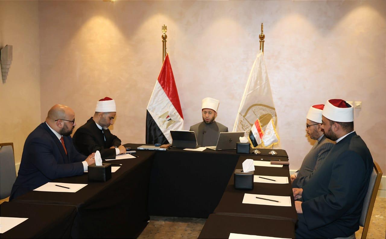 IMG 20251216 WA0098 مناقشة وزير الأوقاف يشارك في مناقشة أطروحة دكتوراه بأكاديمية بلغار عبر الاتصال المرئي موقع في الجامعة