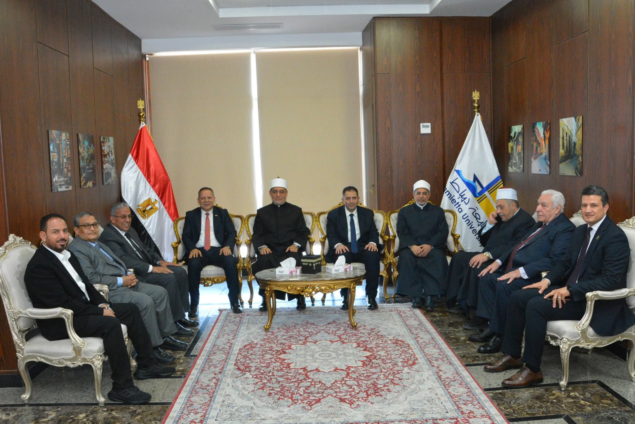 FB IMG 1772116787089 رئيس جامعة دمياط يستقبل مفتي الديار رئيس جامعة دمياط يستقبل مفتي الديار والمحافظ ويؤكد تعزيز التعاون المشترك موقع في الجامعة