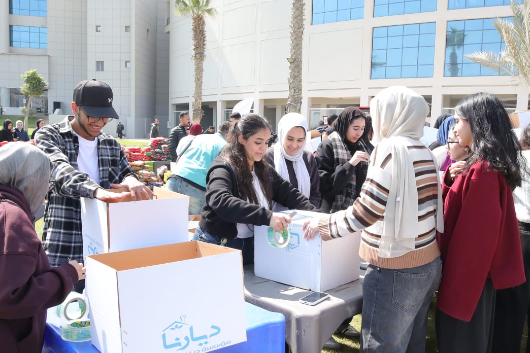 IMG 20260312 WA0034 ندوة بجامعة النيل بروح التطوع.. طلاب جامعة النيل يساهمون في تجهيز كراتين غذائية للأسر الأولى بالرعاية موقع في الجامعة